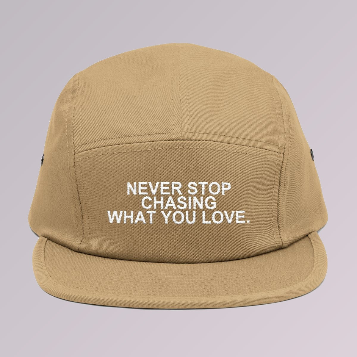 Khaki — NEVER STOP CHASING WHAT YOU LOVE five-panel cap, front view, slogan embroidered across the front panel