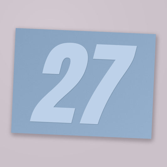 Custom race number decal, white vinyl on transfer sheet